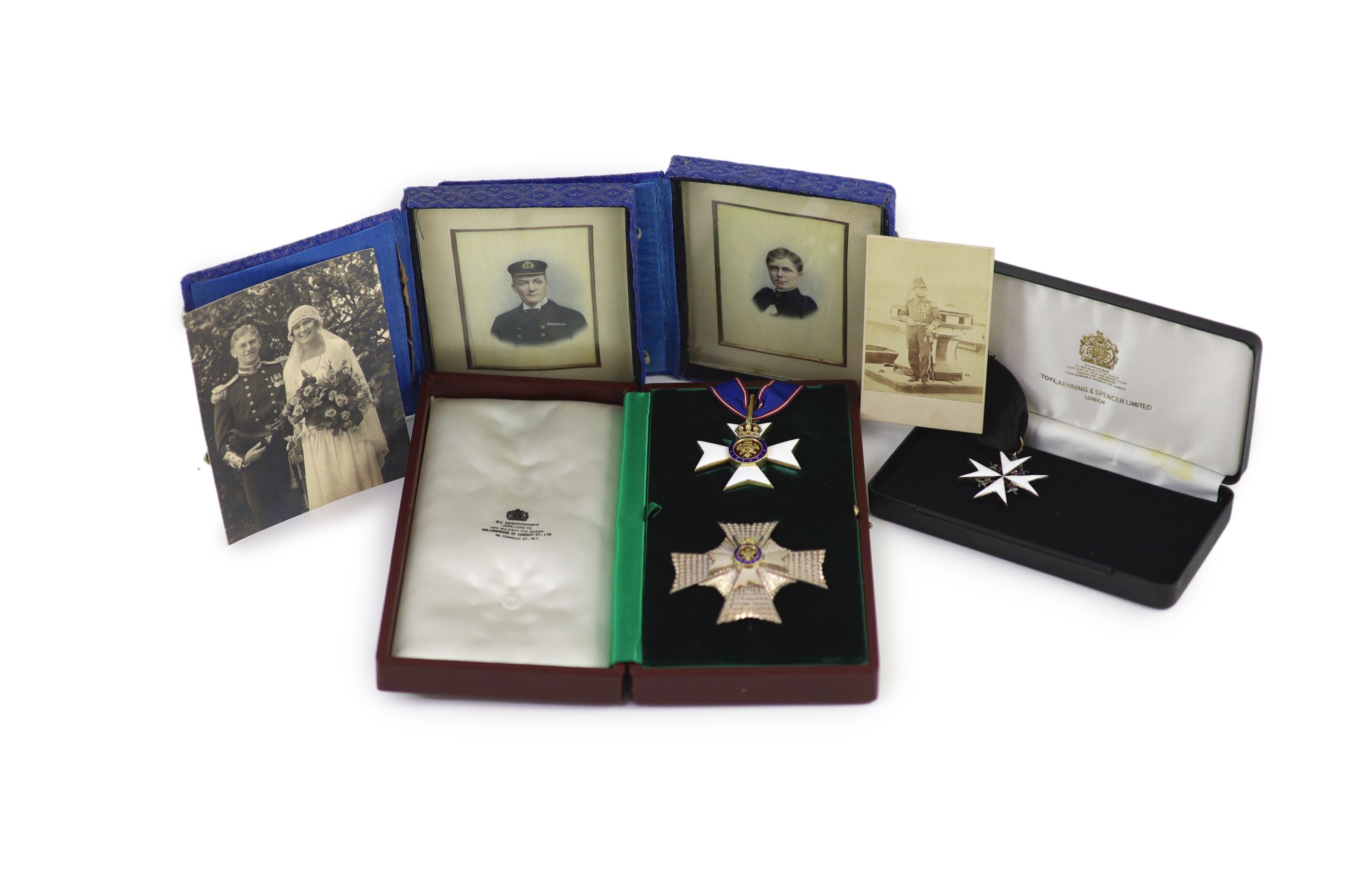 A cased WWI, WWII and Military C.B. medal group to Rear-Admiral John Dent R.N. (1899-1973) and a cased KCVO and Order of St. John to his son Sir Robin John Dent (1929-1999) Case 45.5 x 36 cm